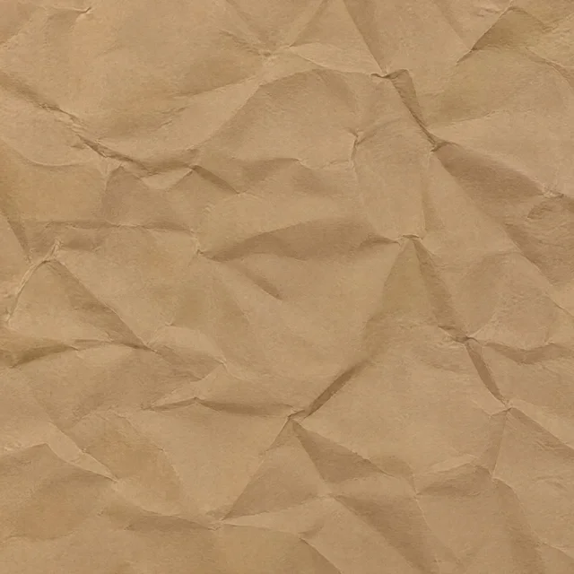 Brown kraft paper texture with deep asymmetric wrinkles and broad angular folds.