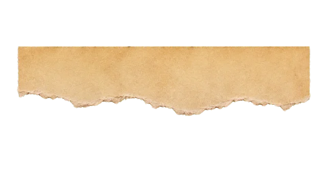 Ochre torn paper PNG showing a single-edge piece with weathered coarse torn fibers and transparent margins.